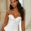 Corset blanco estilo victoriano con encaje, escote corazón y ajuste entallado para mujer